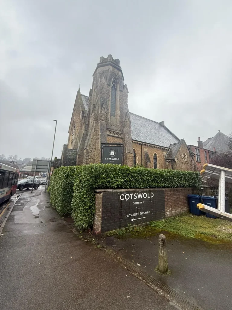 Hedge trimmed outside a church building