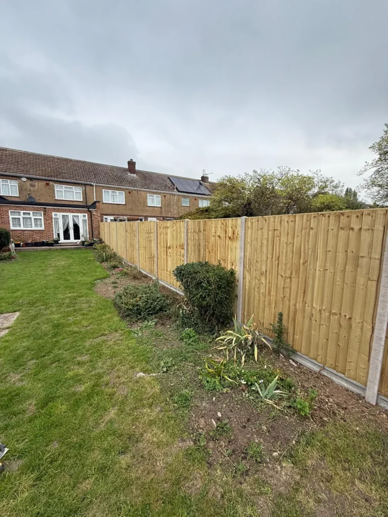 New close-board fence and lawn